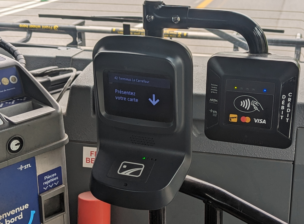 On-board validator displaying logos of payment schemes accepted - Visa, Mastercard, Interac